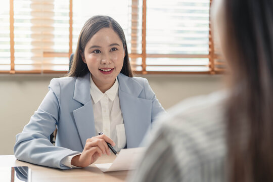 Business professional listening carefully during meeting or consultation at office