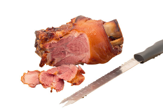 Roasted Crispy Pork Knuckle with Sliced Meat and Serrated Knife