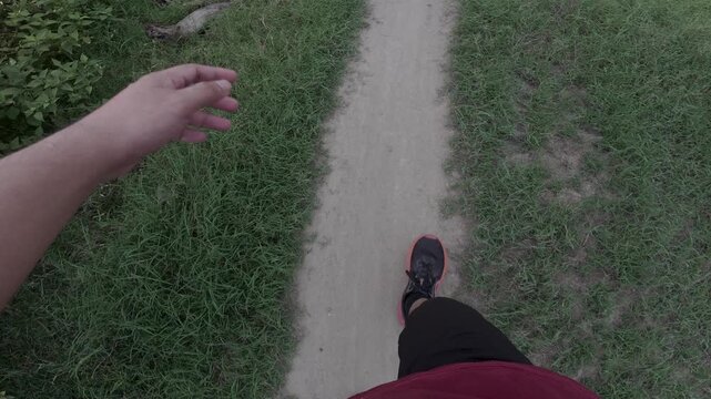 First Person View of Walking on a Dirt Path