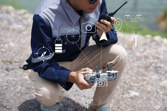Drone Operator Using Walkie Talkie and Remote Controller for Technical Field Survey