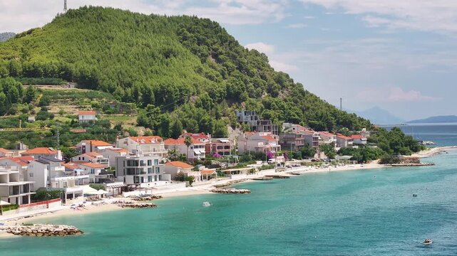 Houses And Rocky Adriatic Coastline In Podstrana, Dalmatia, Croatia