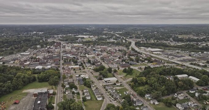 Zanesville Ohio Aerial v6 flyover above residential neighborhoods toward the town center, wooded hillsides and freeway - Shot with Mavic 3 Pro Cine - Sept 22nd 2023