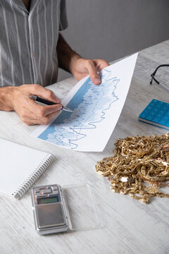 Man with a gold jewelry. Investment and success