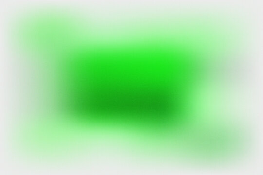 Abstract green gradient background with soft grainy texture and light blur effect.