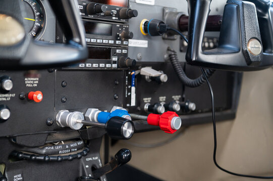 Nairobi, Nairobi County, Kenya - 23 December 2023: View of the cockpit instrument panel and control knobs inside a light aircraft.