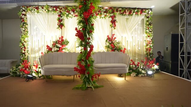 Elegant Wedding Stage Decoration with Floral Backdrop and White Sofa in Uttarakhand India