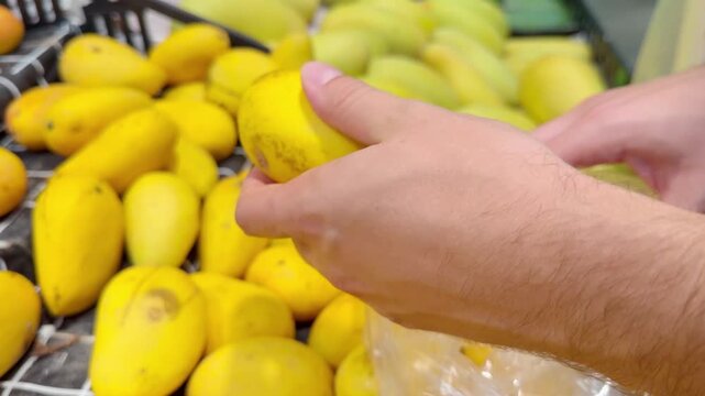 Fresh Tropical Fruits on Display in Supermarket Produce Section &ndash; Assorted Mangoes, Dragon Fruit and Passion Fruit Stacked at the Vegetable Counter
