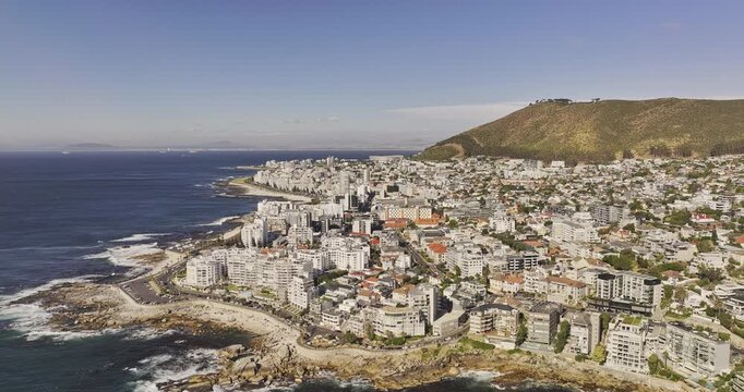 Cape Town South Africa Aerial v14 flyover along the rocky shoreline and beaches of Sea Point and Fresnaye below Signal Hill - Shot with Mavic 3 Pro Cine - Jan 10th 2024