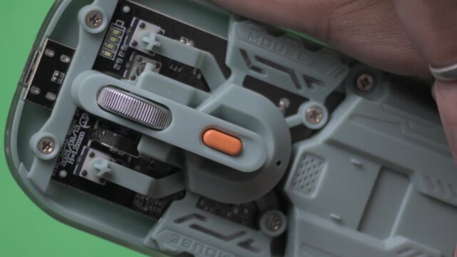 Macro View of Electronic Mouse Components and Scroll Wheel.