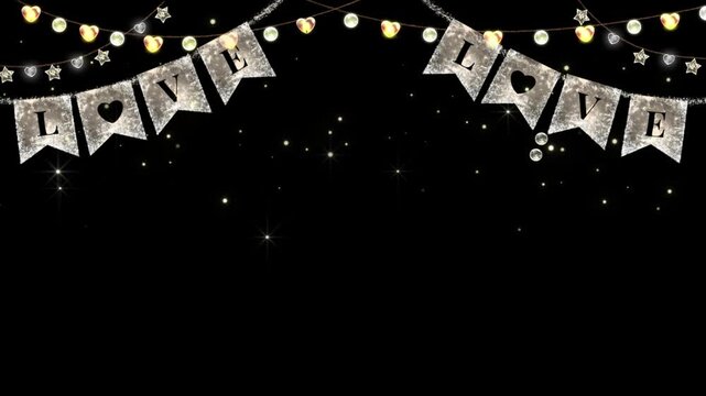 Festive bunting flags spelling out love hang alongside string lights and sparkling stars against a black background.