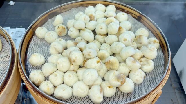 Freshly Cooked Dumplings on Display at Supermarket Ready-Meal Section &ndash; Hot Takeaway Food