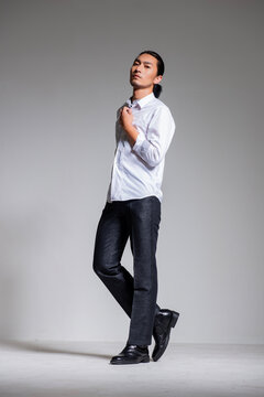 Mature and sophisticated basic menswear, high-quality gray background for portrait photography