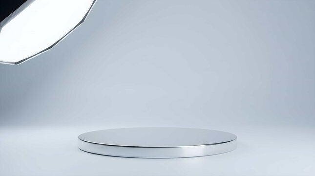 Minimalist Silver Circular Display Podium for Luxury Product Presentation with Cinematic Overhead Studio Lighting in a Clean Modern Setting