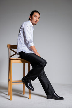 Mature and sophisticated basic menswear, high-quality gray background for portrait photography