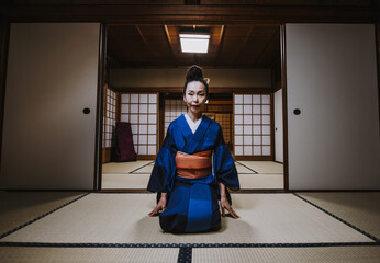 Beautiful japanese woman in a traditional japanese house © oneinchpunch