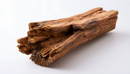 Fototapeta premium Broken wooden log with rough texture rests on white background. Damaged brown tree branch exhibits jagged splinters, fractured grain. Natural timber piece shows rustic detail for construction design