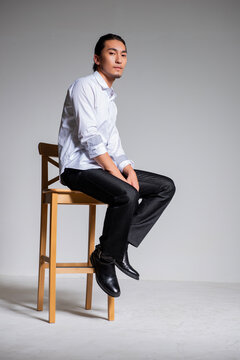 Mature and sophisticated basic menswear, high-quality gray background for portrait photography