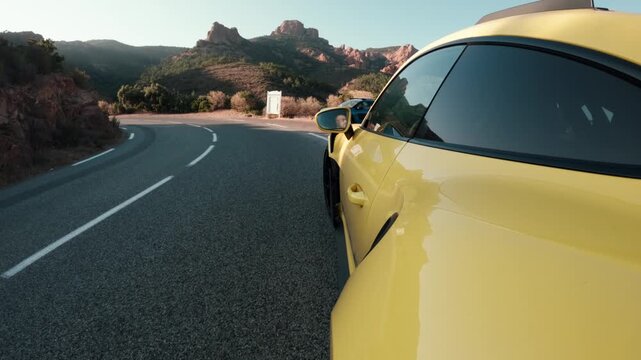 Car Driving on a Winding Mountain Road, Exterior Tracking Shot in Summer, Warm Sunny Weather, Scenic Road Trip and Vacation Travel