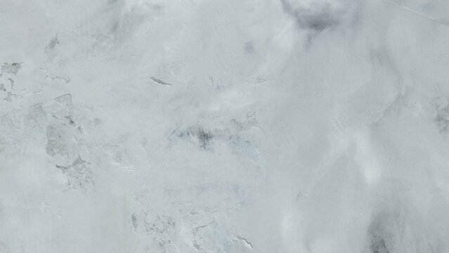 Gray concrete wall texture with weathered stained surface for industrial design