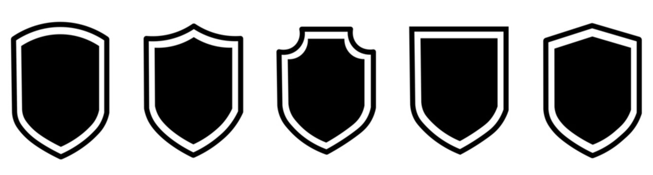 Minimalist shield icons set, black heraldic crest silhouettes, 5 vector security badges for branding and protection logos