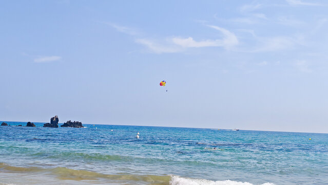kite surfing on the sea. Sea summer entertainment. Free space for text.
