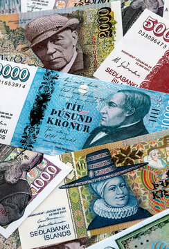 Icelandic krona money banknotes pile on table. Iceland bills of ISK currency. Concept of economy