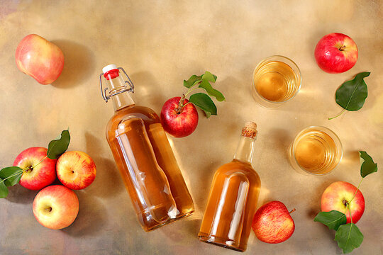 Autumn banner.Apple cider, juice or fruit drink and ingredients on a sunny table. The concept of diet and weight loss. Apples help cleanse the body and reduce weight. Healthy food, body detoxification