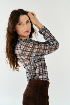 Elegant young woman showcasing chic style with confidence and poise