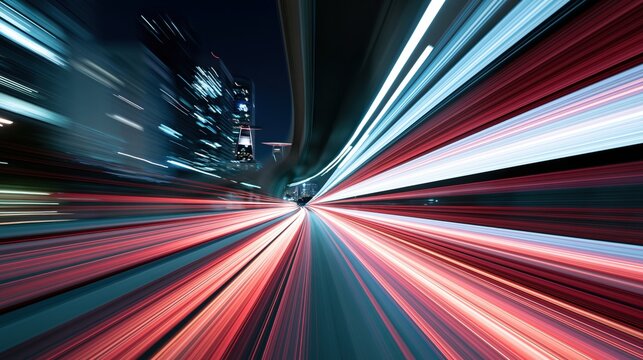 Urban Highway at Night with Vibrant Traffic Light Trails and Illuminated City Skyline