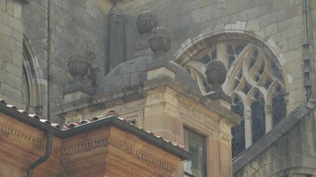 Architectural detail of Oviedo Cathedral facade and Reyes Caudillos garden