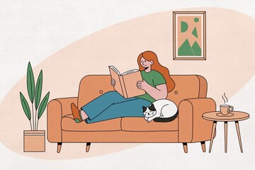 Woman reads a book on the sofa next to a sleeping cat
