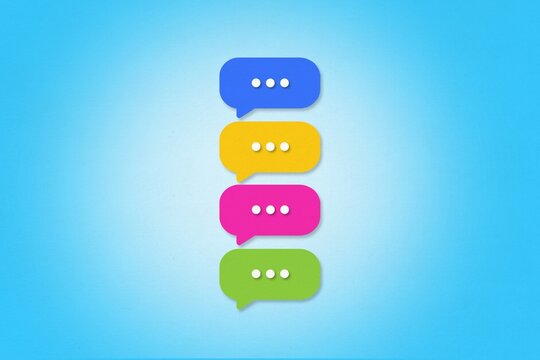 A colorful speech bubble icon stack represents digital communication