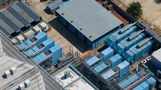 Aerial view shows a data center with HVAC systems and generators