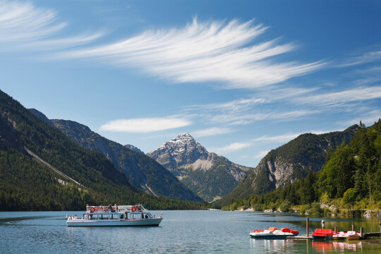 Austria, Tyrol, Tourist in boat on lake plansee near reutte
