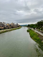 Fototapeta premium Scenic View of Kamo River and Pontocho Wooden Platforms in Kyoto Japan
