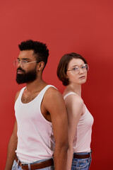 Obraz premium Celebrating love between a stylish multiracial couple in a vibrant setting