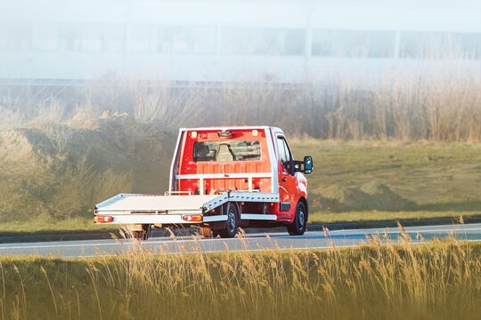 Flatbed wrecker truck used for car towing