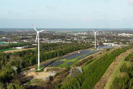 Clean electricity industry with solar panels and wind power turbines