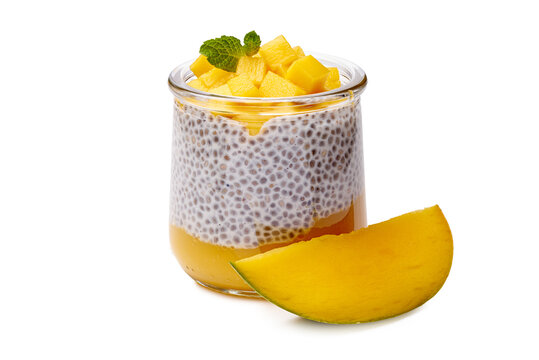 presentation of chia pudding with mango slice on white background, clean and fresh look, healthy eating concept, food photography, natural light, vibrant yellow and green colors.
