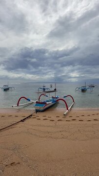 Traditional Jukung fishing boats on Sanur beach,Bali, Indonesia