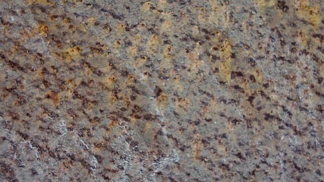 Close up of textured rust metal surface.