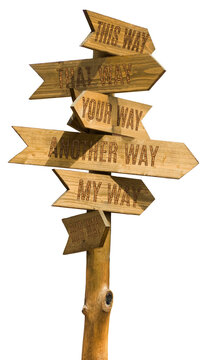 Wooden signpost with multiple directional arrows pointing in different ways