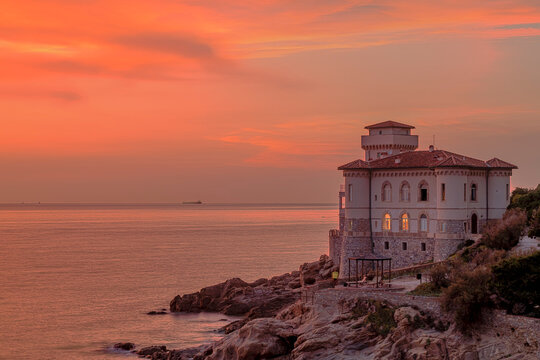 A colorful sunset south of Livorno, Italy, near the ancient Boccale Castle
