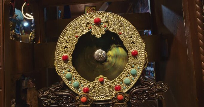 Chengdu, Sichuan, China. Rolling Dharmachakra Wheel Or Wheel Of Dharma. Symbol