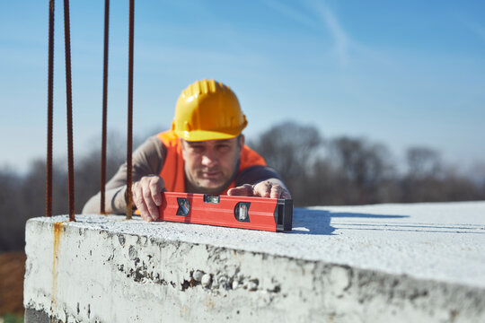 Construction worker working outdoors on a construction site.