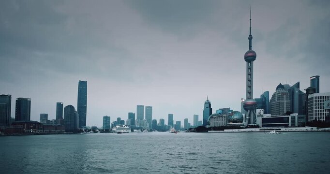 Shanghai, China. large container ship sailing on the Huangpu River framed by Shanghai's skyline