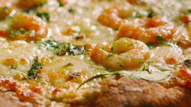 Close-up over King Prawn Pizza with Mozzarella Cheese and Tomato Base.
