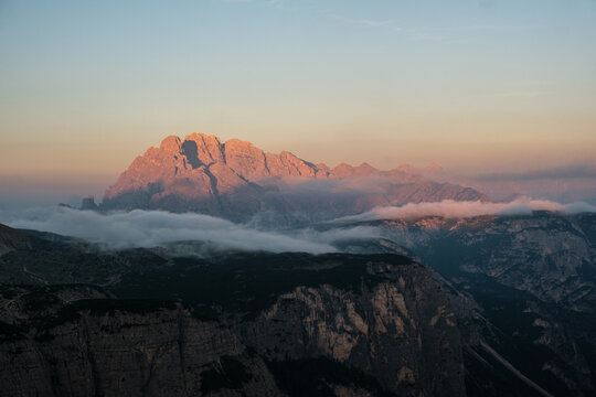 Dolomites mountain landscape at sunset in Italy, beautiful European Alps scenic peak view and travel destination concept