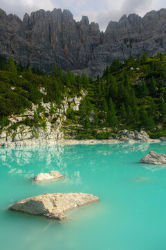 Dolomites mountain landscape under clear azure blue sky at sunset in Italy, scenic European Alps peak view concept