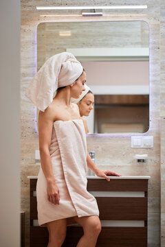 Woman getting ready engaging morning routine